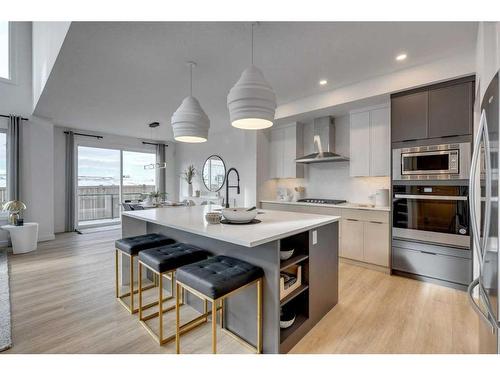 25 Snowberry Lane East, Okotoks, AB - Indoor Photo Showing Kitchen With Stainless Steel Kitchen With Upgraded Kitchen