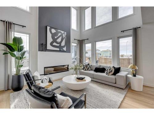 25 Snowberry Lane East, Okotoks, AB - Indoor Photo Showing Living Room With Fireplace