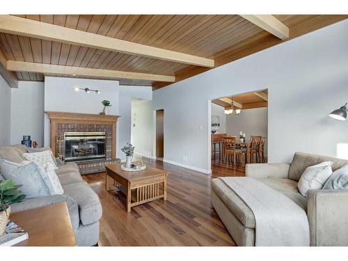 752 Archwood Road Se, Calgary, AB - Indoor Photo Showing Living Room With Fireplace