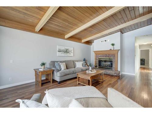 752 Archwood Road Se, Calgary, AB - Indoor Photo Showing Living Room With Fireplace