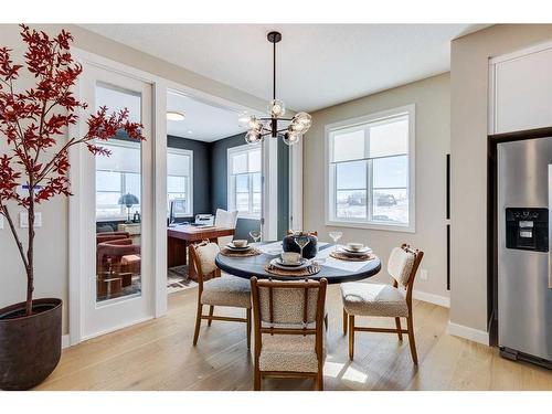 204 Langwell Common Se, Airdrie, AB - Indoor Photo Showing Dining Room