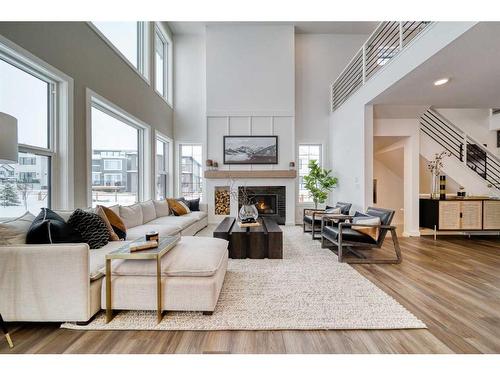 68 Dawson Wharf Mount, Chestermere, AB - Indoor Photo Showing Living Room With Fireplace