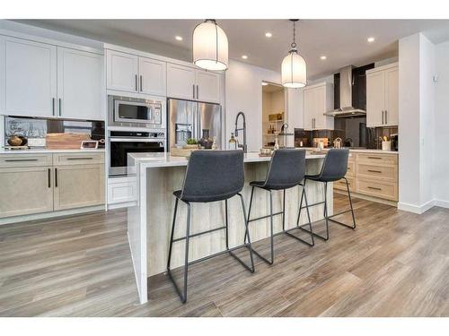 68 Dawson Wharf Mount, Chestermere, AB - Indoor Photo Showing Kitchen With Stainless Steel Kitchen With Upgraded Kitchen