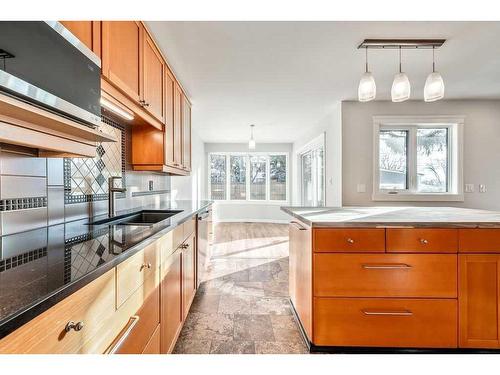 14 Columbia Place Nw, Calgary, AB - Indoor Photo Showing Kitchen With Double Sink