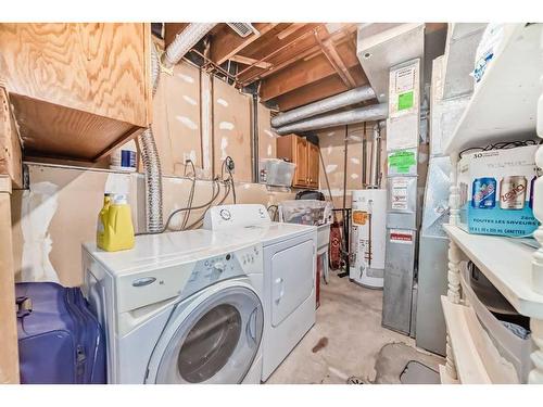 10-4740 Dalton Dr, Calgary Drive, Calgary, AB - Indoor Photo Showing Laundry Room