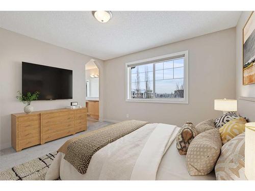 46 Chapman Close Se, Calgary, AB - Indoor Photo Showing Bedroom