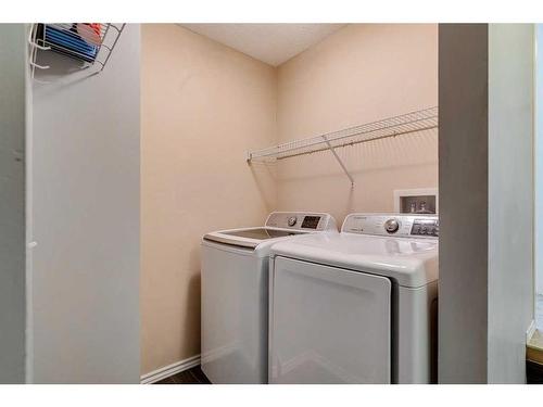 559 Douglas Glen Boulevard Se, Calgary, AB - Indoor Photo Showing Laundry Room