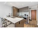 309-1025 5 Avenue Sw, Calgary, AB  - Indoor Photo Showing Kitchen With Double Sink With Upgraded Kitchen 