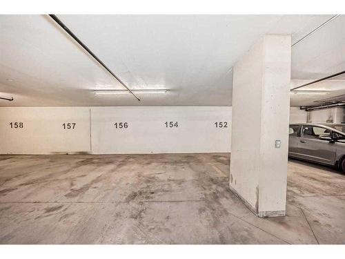 309-1025 5 Avenue Sw, Calgary, AB - Indoor Photo Showing Garage