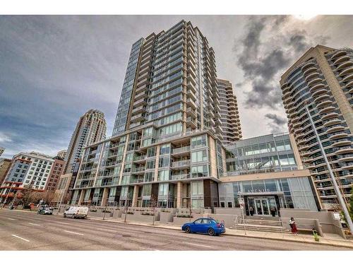 309-1025 5 Avenue Sw, Calgary, AB - Outdoor With Balcony With Facade