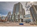 309-1025 5 Avenue Sw, Calgary, AB  - Outdoor With Balcony With Facade 