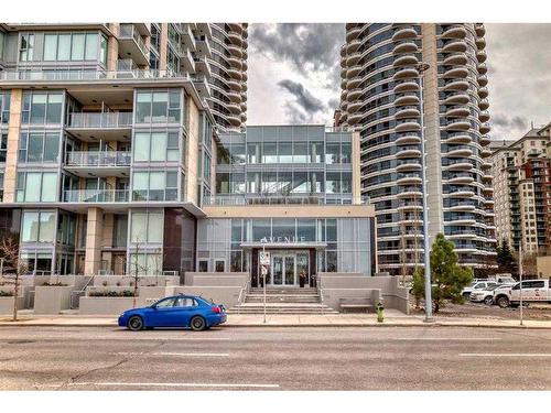 309-1025 5 Avenue Sw, Calgary, AB - Outdoor With Balcony With Facade