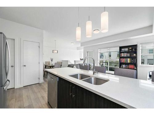 36 Spring Creek Common Sw, Calgary, AB - Indoor Photo Showing Kitchen With Double Sink With Upgraded Kitchen