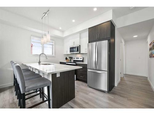 36 Spring Creek Common Sw, Calgary, AB - Indoor Photo Showing Kitchen With Stainless Steel Kitchen With Upgraded Kitchen