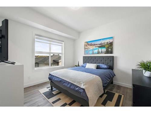 36 Spring Creek Common Sw, Calgary, AB - Indoor Photo Showing Bedroom