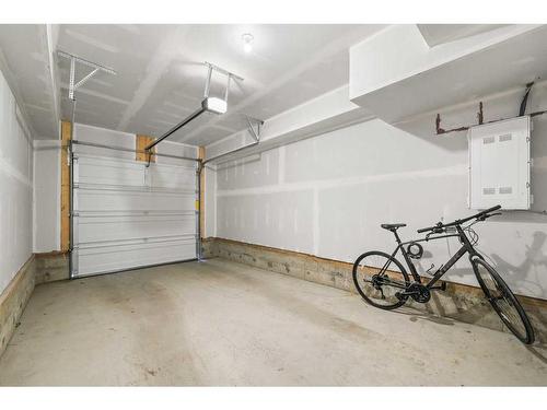 36 Spring Creek Common Sw, Calgary, AB - Indoor Photo Showing Garage