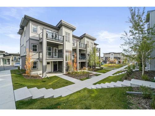 36 Spring Creek Common Sw, Calgary, AB - Outdoor With Balcony With Facade