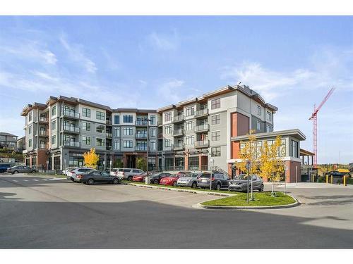 36 Spring Creek Common Sw, Calgary, AB - Outdoor With Balcony With Facade