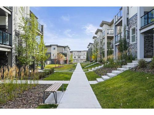 36 Spring Creek Common Sw, Calgary, AB - Outdoor With Balcony With Facade