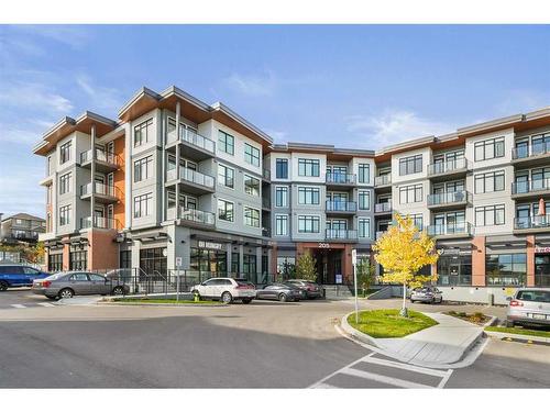 36 Spring Creek Common Sw, Calgary, AB - Outdoor With Balcony With Facade