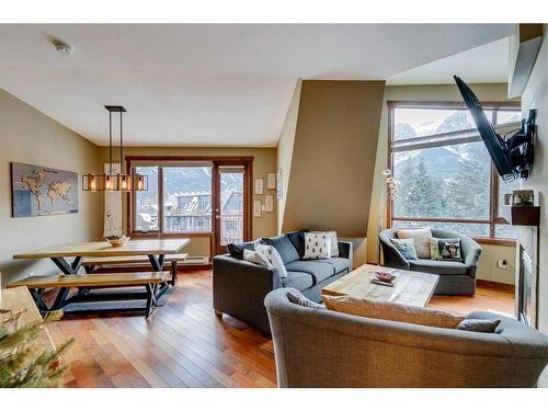 302-1002 8 Avenue, Canmore, AB - Indoor Photo Showing Living Room