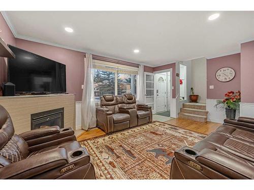 344-4525 31 Street Sw, Calgary, AB - Indoor Photo Showing Living Room With Fireplace