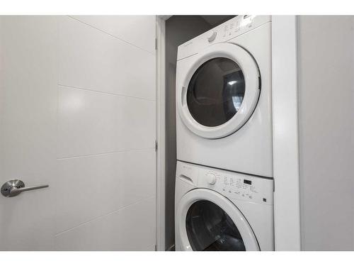 107-8 Sage Hill Terrace Nw, Calgary, AB - Indoor Photo Showing Laundry Room