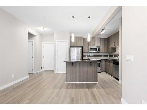 107-8 Sage Hill Terrace Nw, Calgary, AB - Indoor Photo Showing Kitchen With Upgraded Kitchen