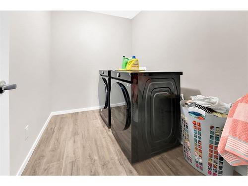 113 Cityline Square Ne, Calgary, AB - Indoor Photo Showing Laundry Room