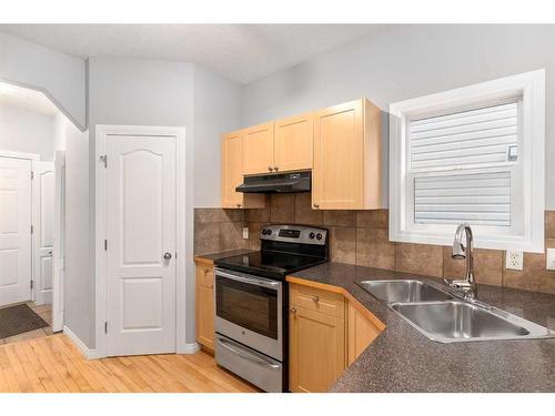 242 Covemeadow Bay Ne, Calgary, AB - Indoor Photo Showing Kitchen With Double Sink