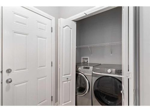 242 Covemeadow Bay Ne, Calgary, AB - Indoor Photo Showing Laundry Room