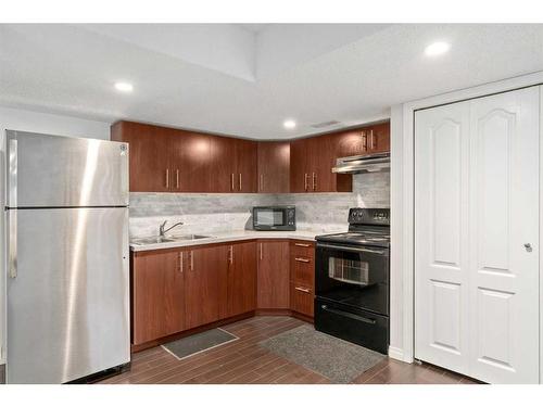 242 Covemeadow Bay Ne, Calgary, AB - Indoor Photo Showing Kitchen With Double Sink