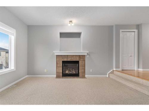 242 Covemeadow Bay Ne, Calgary, AB - Indoor Photo Showing Other Room With Fireplace