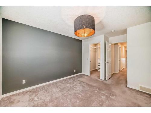 67 Sundown Terrace, Cochrane, AB - Indoor Photo Showing Other Room