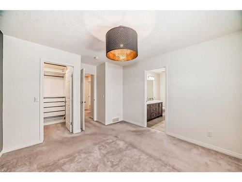 67 Sundown Terrace, Cochrane, AB - Indoor Photo Showing Other Room