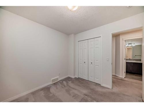 67 Sundown Terrace, Cochrane, AB - Indoor Photo Showing Other Room