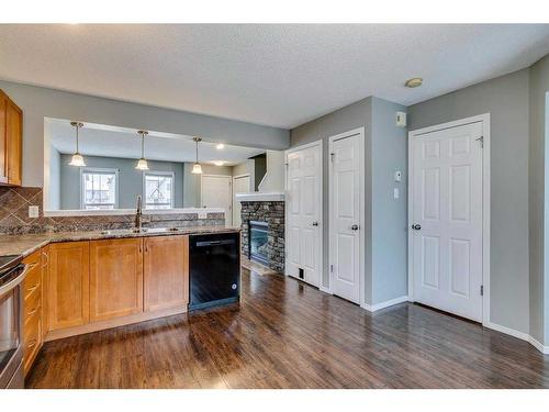 140 Elgin Point Se, Calgary, AB - Indoor Photo Showing Kitchen With Double Sink