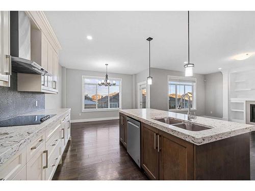 1108 Veterans Avenue, Crossfield, AB - Indoor Photo Showing Kitchen With Double Sink With Upgraded Kitchen