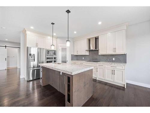 1108 Veterans Avenue, Crossfield, AB - Indoor Photo Showing Kitchen With Stainless Steel Kitchen With Double Sink With Upgraded Kitchen