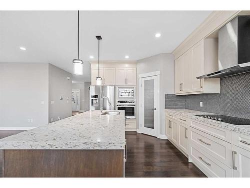 1108 Veterans Avenue, Crossfield, AB - Indoor Photo Showing Kitchen With Upgraded Kitchen