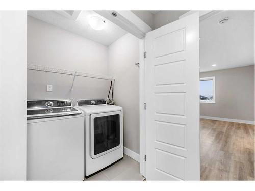 1108 Veterans Avenue, Crossfield, AB - Indoor Photo Showing Laundry Room