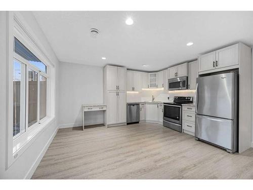 1108 Veterans Avenue, Crossfield, AB - Indoor Photo Showing Kitchen With Stainless Steel Kitchen