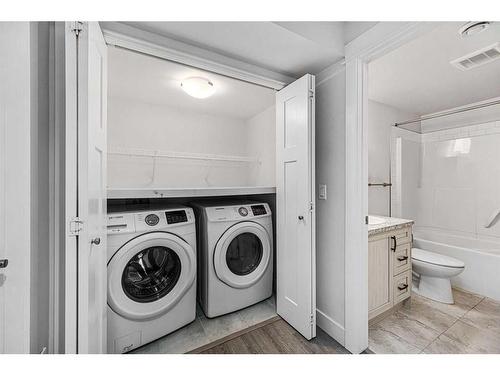 1108 Veterans Avenue, Crossfield, AB - Indoor Photo Showing Laundry Room