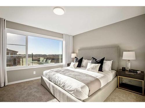 18 Wedderburn Gate, Okotoks, AB - Indoor Photo Showing Bedroom