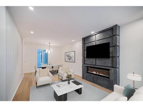 1404 22 Avenue Nw, Calgary, AB - Indoor Photo Showing Living Room With Fireplace