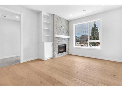 1742 24A Street Sw, Calgary, AB - Indoor Photo Showing Living Room With Fireplace