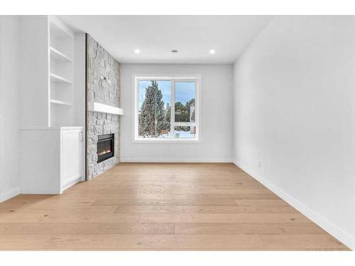 1742 24A Street Sw, Calgary, AB - Indoor With Fireplace