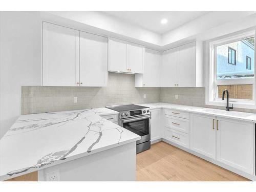 1742 24A Street Sw, Calgary, AB - Indoor Photo Showing Kitchen With Upgraded Kitchen