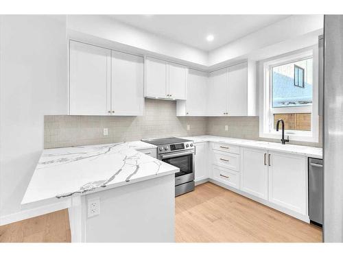 1742 24A Street Sw, Calgary, AB - Indoor Photo Showing Kitchen With Upgraded Kitchen