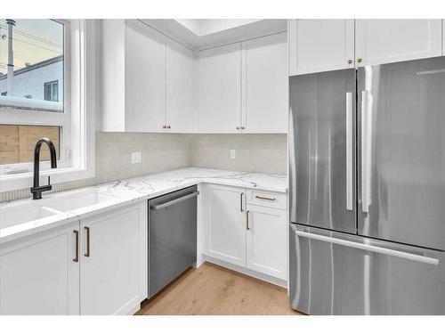 1742 24A Street Sw, Calgary, AB - Indoor Photo Showing Kitchen With Double Sink